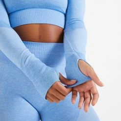 DOMYOS Long-Sleeved Cropped Seamless Fitness T-Shirt BLUE/Iced coffee -Women Sports Elegant Store k1924b2baebcf33039bf051605a229d0a